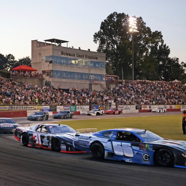 FILE - Zack Ore (55) leads Chase Roberston (31) in to turns one and two during the 40-lap Sportsman Series race on Saturday, Aug. 24, 2024 at Bowman Gray Stadium in Winston-Salem, N.C. (Walt Unks/The Winston-Salem Journal via AP, File)