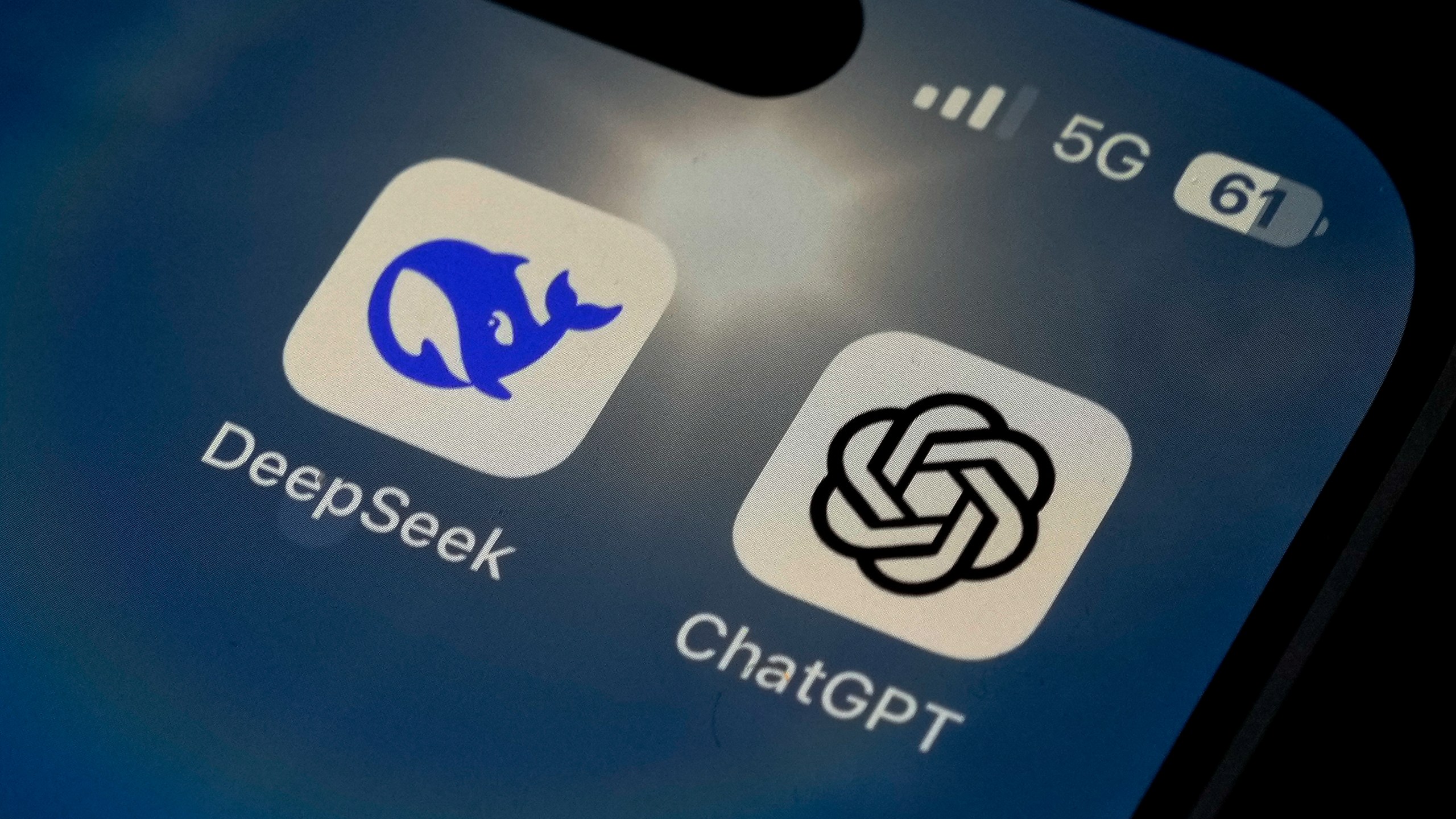 The Icons for the smartphone apps DeepSeek and ChatGPT are seen on a smartphone screen in Beijing, Tuesday, Jan. 28, 2025. (AP Photo/Andy Wong)