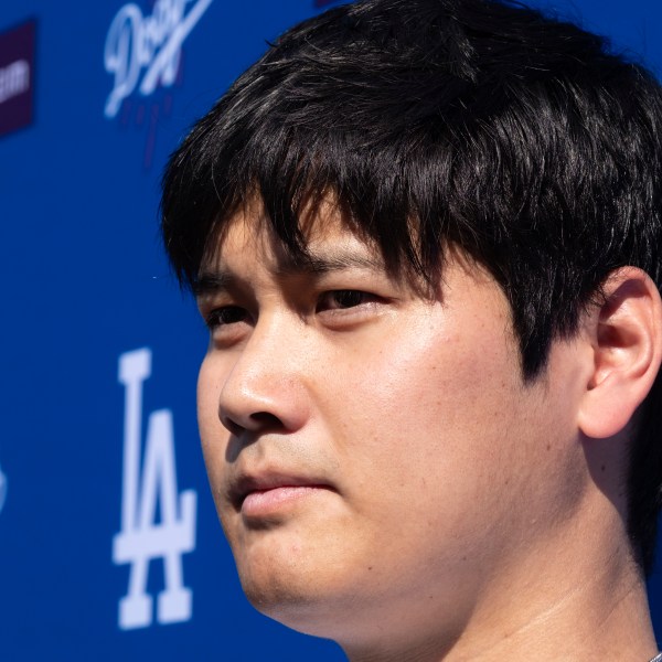 Los Angeles Dodgers' Shohei Ohtani talks to the media during a baseball interview during DodgerFest at Dodger Stadium, Saturday, Feb. 1, 2025, in Los Angeles. (AP Photo/Richard Vogel)