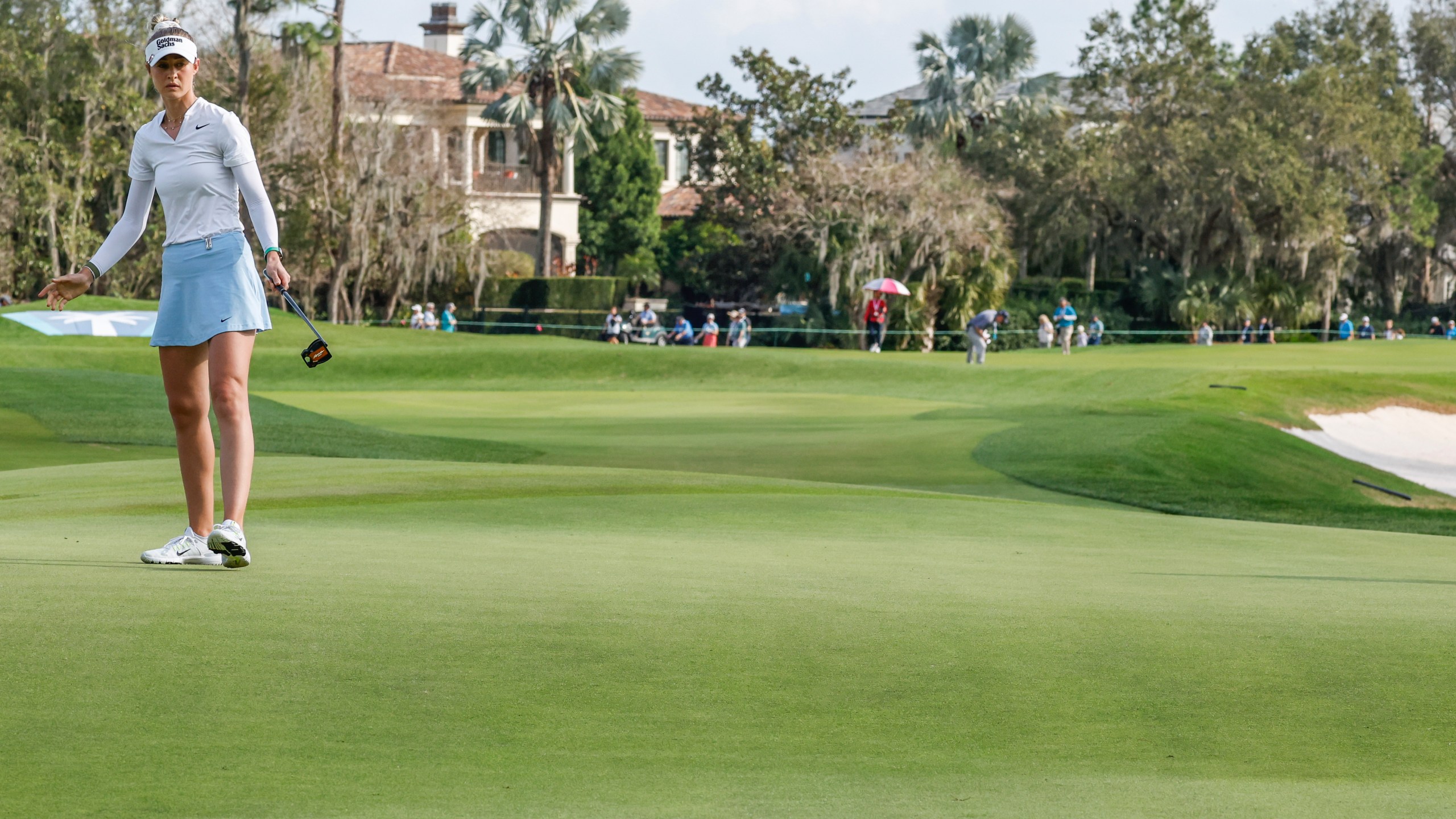 Nelly Korda watches her putt on the 18th green during the final round of the Hilton Grand Vacations Tournament of Champions LPGA golf tournament in Orlando, Fla., Sunday, Feb. 2, 2025. (AP Photo/Kevin Kolczynski)