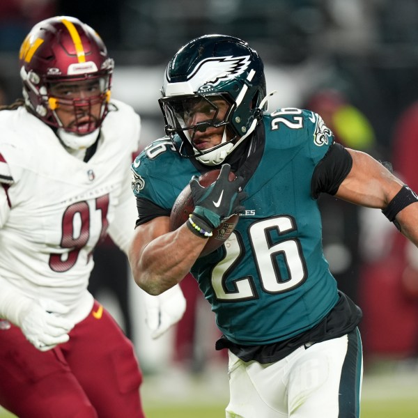 Philadelphia Eagles running back Saquon Barkley runs against the Washington Commanders during the second half of the NFC Championship NFL football game, Sunday, Jan. 26, 2025, in Philadelphia. (AP Photo/Chris Szagola)