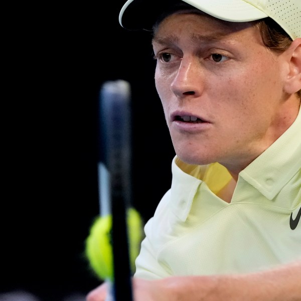 FILE -Jannik Sinner of Italy plays a backhand return to Alexander Zverev of Germany during the men's singles final at the Australian Open tennis championship in Melbourne, Australia, Jan. 26, 2025. (AP Photo/Asanka Brendon Ratnayake, File)