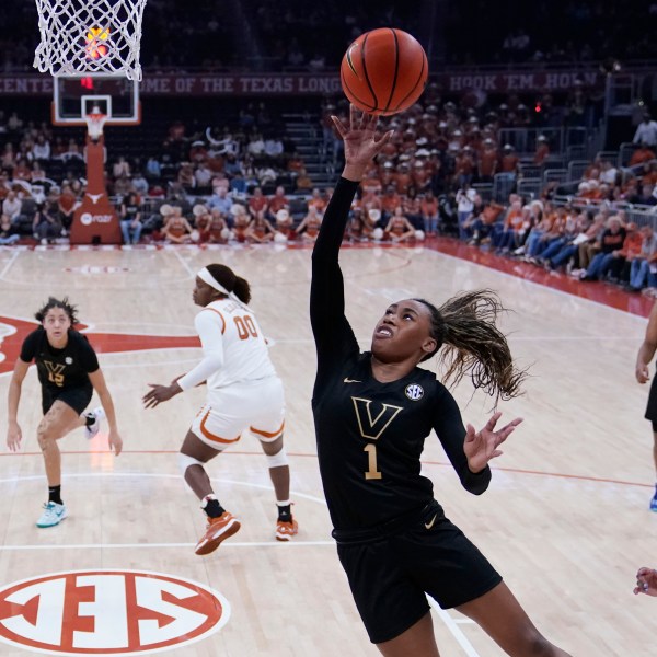 Vanderbilt guard Mikayla Blakes (1) scores against Texas during the first half of an NCAA college basketball game in Austin, Texas, Thursday, Feb. 6, 2025. (AP Photo/Eric Gay)