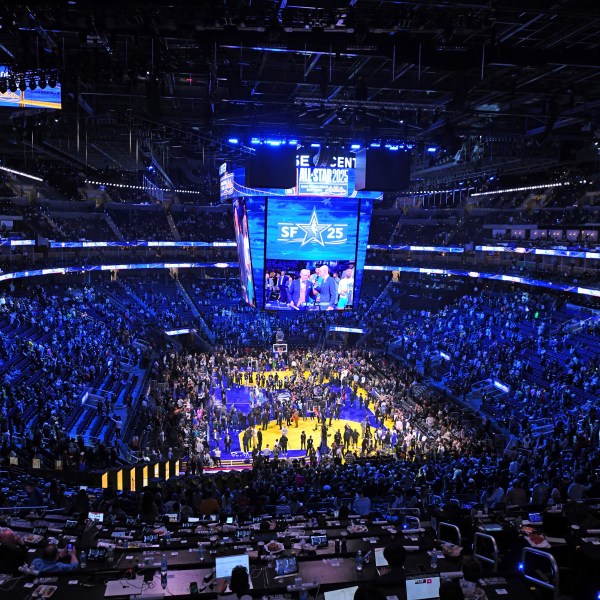 NBA fans gather to watch the trophy ceremony of the NBA All-Star basketball game in San Francisco, on Sunday, Feb. 16, 2025. (Jose Carlos Fajardo/Bay Area News Group via AP)