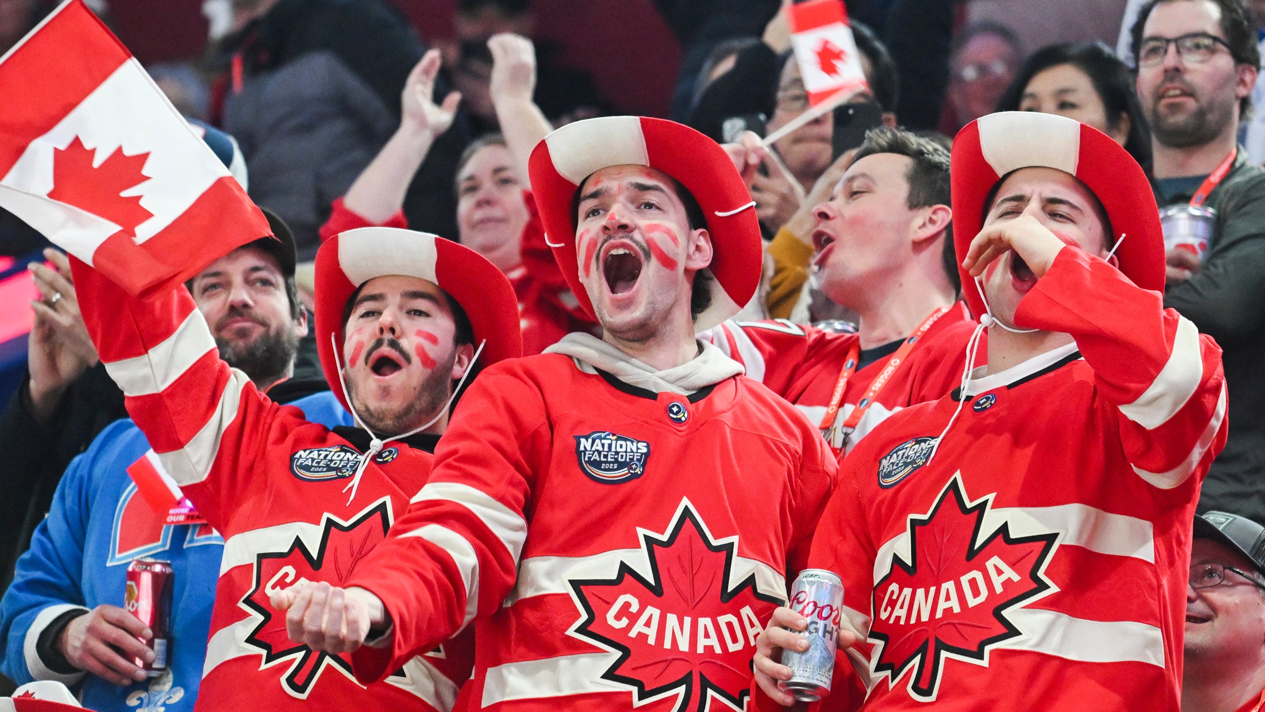 Canada fans cheer their team as they take to the ice ahead of their 4 Nations Face-Off hockey game against the United States in Montreal, Saturday, Feb. 15, 2025, in Montreal. (Christinne Muschi/The Canadian Press via AP)