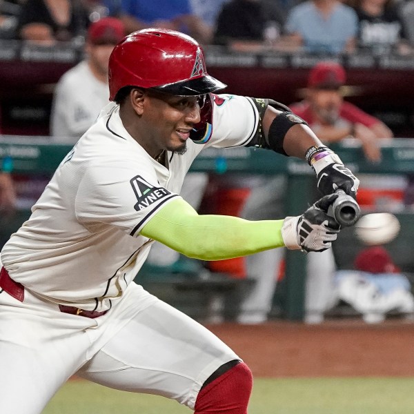 Arizona Diamondbacks' Geraldo Perdomo bunts against the San Diego Padres during the fourth inning of a baseball game, Sunday, Sept. 29, 2024, in Phoenix. (AP Photo/Darryl Webb, File)