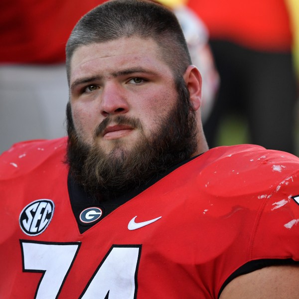 FILE - In this Sept. 1, 2018, file photo, Georgia offensive lineman Ben Cleveland (74) sits on the bench during the second half of an NCAA college football game against Austin Peay, in Athens, Ga. (AP Photo/Mike Stewart, File)