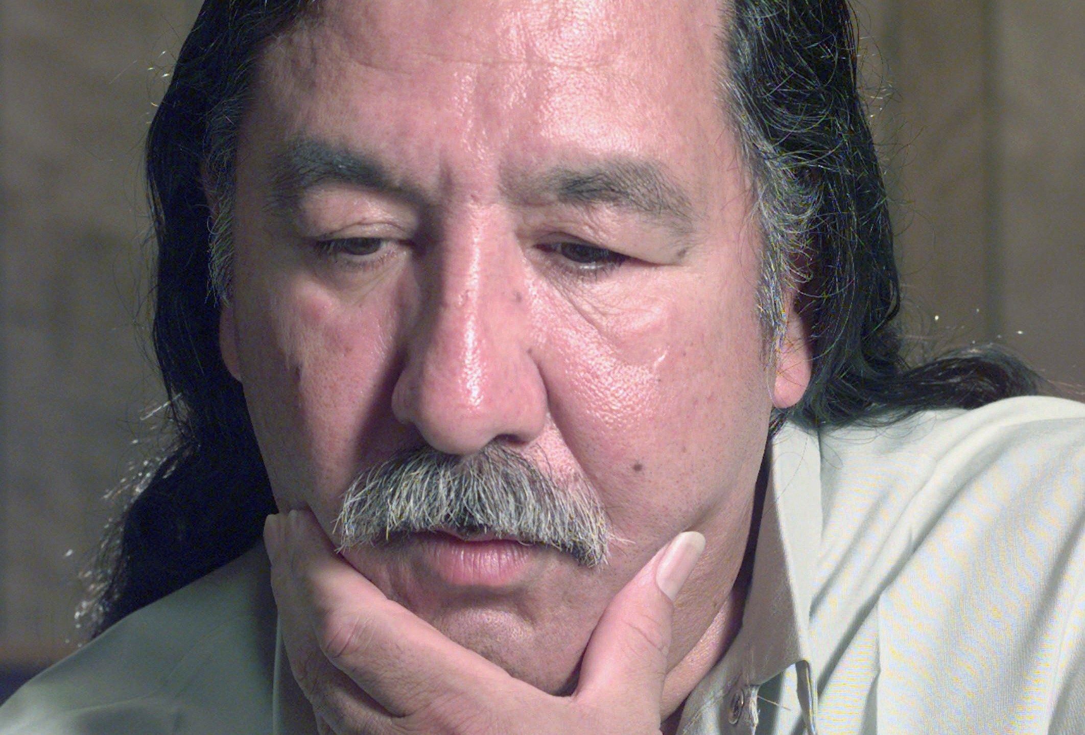 FILE - American Indian activist Leonard Peltier speaks during an interview at the U.S. Penitentiary at Leavenworth, Kan., April 29, 1999. (Joe Ledford/The Kansas City Star via AP, File)