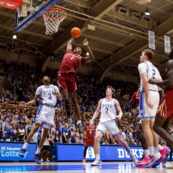 Florida State's Jamir Watkins (1) dunks during the first half of an NCAA college basketball game against Duke in Durham, N.C., Saturday, Mar. 1, 2025. (AP Photo/Ben McKeown)