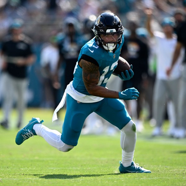 FILE - Jacksonville Jaguars wide receiver Christian Kirk runs after catching a pass against the Green Bay Packers during the second half of an NFL football game, Oct. 27, 2024, in Jacksonville, Fla. (AP Photo/Phelan M. Ebenhack, file)