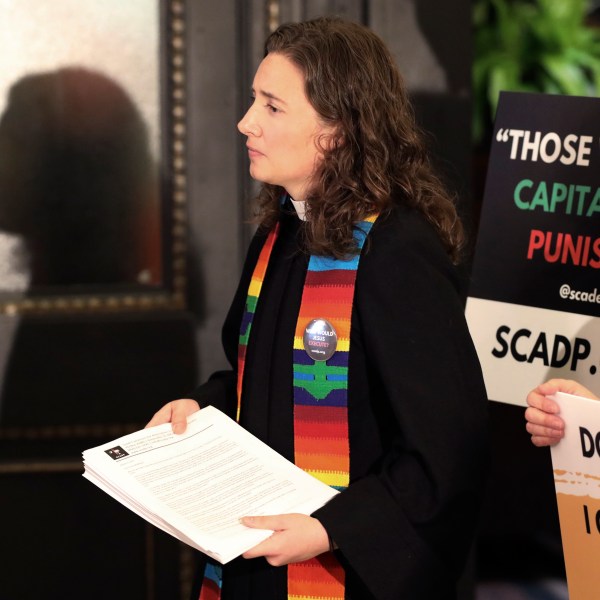 Rev. Hillary Taylor of South Carolinians for Alternatives to the Death Penalty prepares to present a petition to stop the firing squad execution of Brad Sigmon to the South Carolina governor's office on Thursday, March 6, 2025, in Columbia, S.C. (AP Photo/Jeffrey Collins)