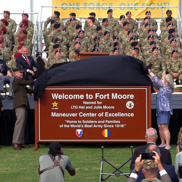 FILE - The children of Lt. Gen. Hal and Julia Moore join the command team at what's now Fort Moore during the unveiling the new sign, May 11, 2023, in Fort Moore, Ga. (Mike Haskey/Ledger-Enquirer via AP, File)