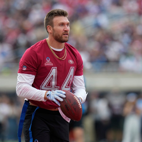 FILE - NFC fullback Kyle Juszczyk, of the San Francisco 49ers, looks to the stands after scoring a touchdown during the flag football event at the NFL Pro Bowl, Feb. 2, 2025, in Orlando. (AP Photo/Chris O'Meara, File)