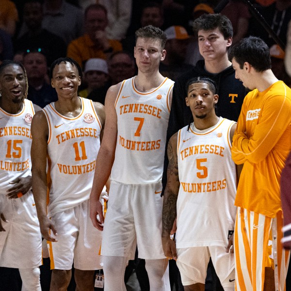 Tennessee seniors guard Jahmai Mashack (15), guard Jordan Gainey (11), Igor Milicic Jr. and guard Zakai Zeigler (5) watch play in the final seconds during the second half of an NCAA college basketball game against South Carolina, Saturday, March 8, 2025, in Knoxville, Tenn. (AP Photo/Wade Payne)