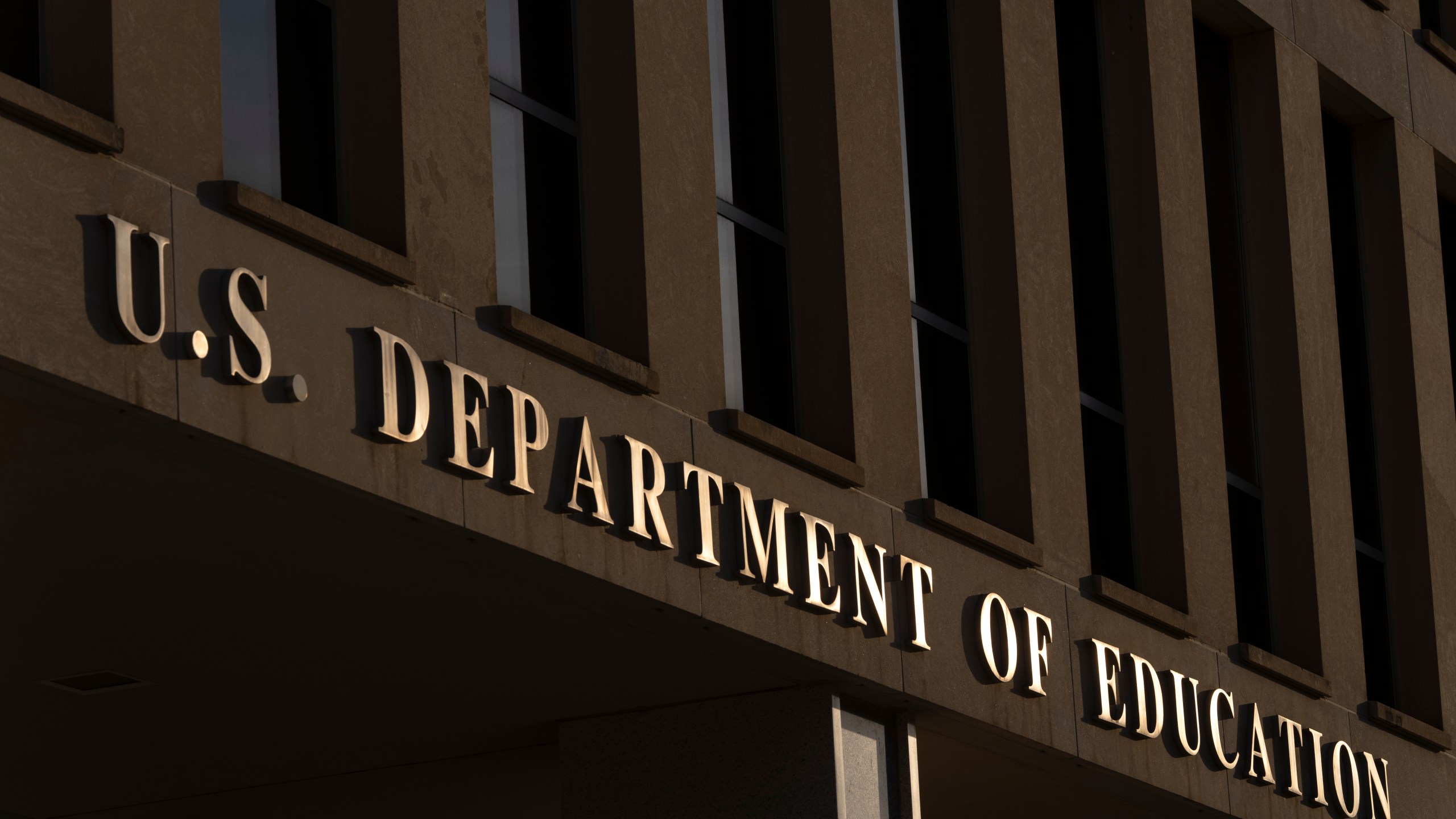 The headquarters of the U.S. Department of Eduction, which were ordered closed for the day for what officials described as security reasons amid large-scale layoffs, are seen Wednesday, March 12, 2025, in Washington. (AP Photo/Mark Schiefelbein)